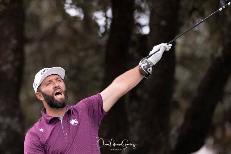 JON RAHM, taking the first shot from hole 1