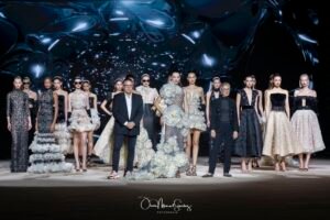 The models walk the runway and pose with designer HANNIBAL LAGUNA